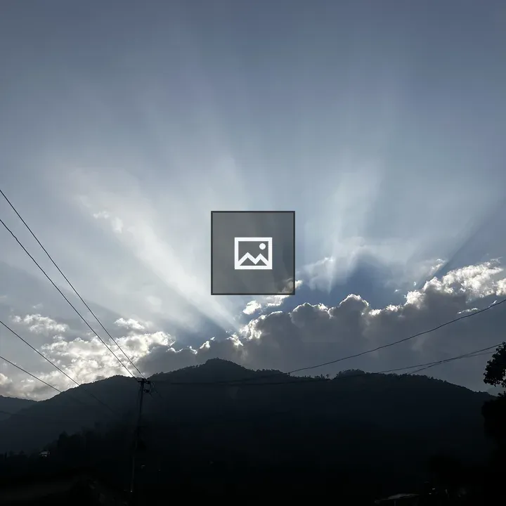 Silhouette of Mountain Range at Sunrise