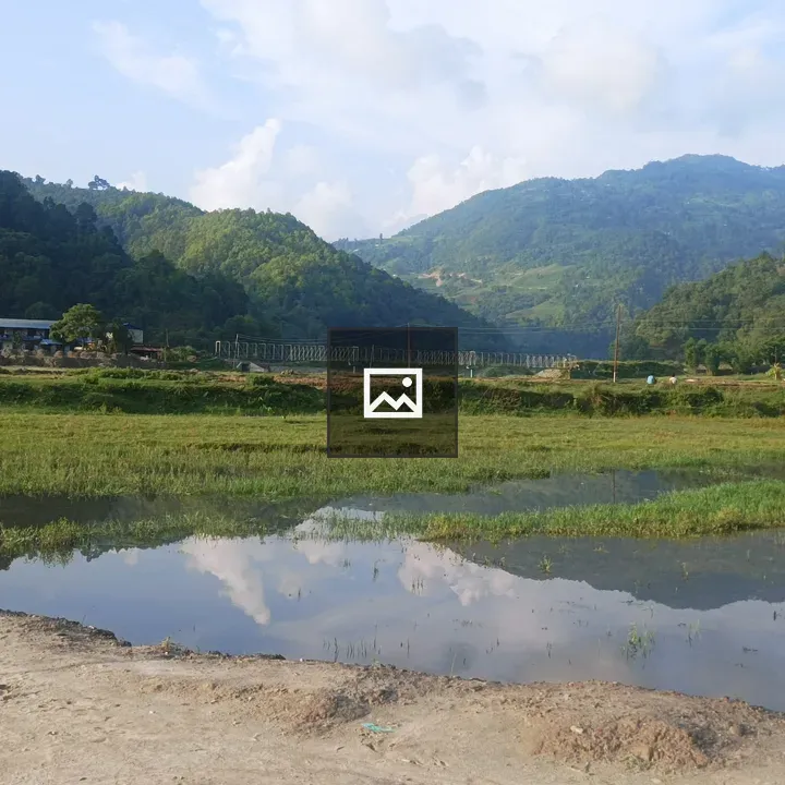 Scenic landscape with cloud reflection