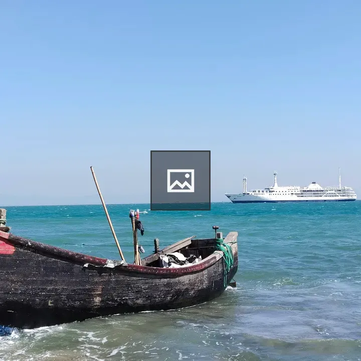 Fish boat in front of cruise ship