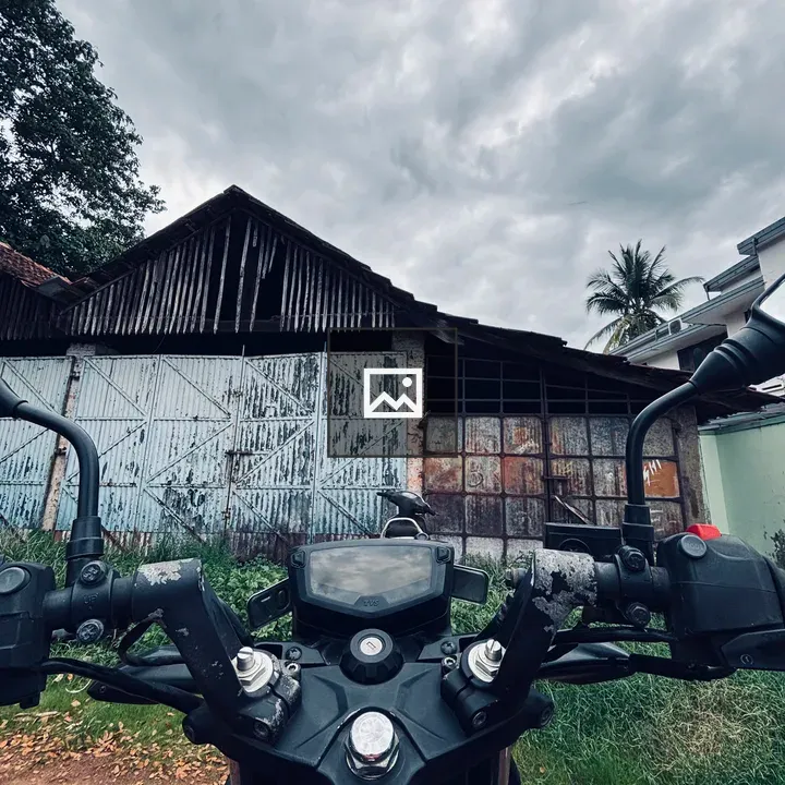 View from a Motorcycle toward Barn