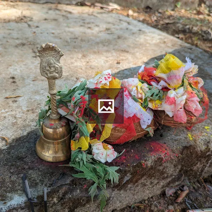 Colorful offerings on stone slab