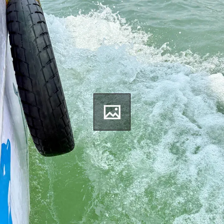 Water Splash Near Tire on Boat