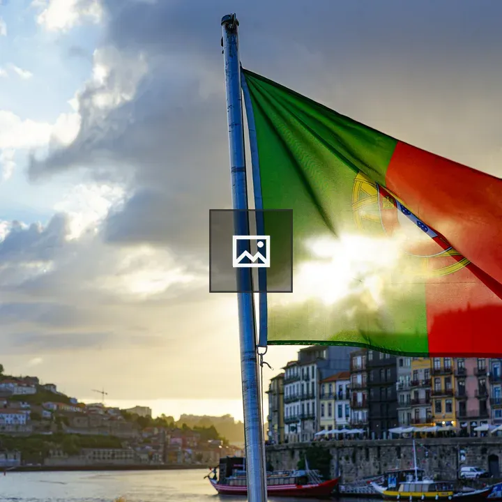 Portuguese flag over Douro coast