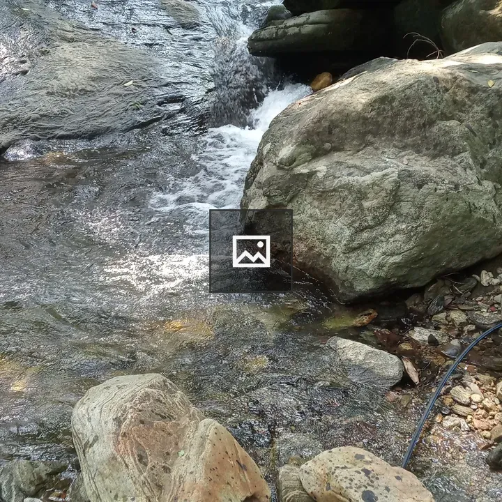Waterfalls on a hilltop path