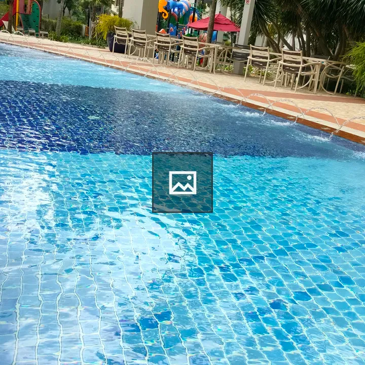 Clear Swimming Pool with Mosaic Tiles