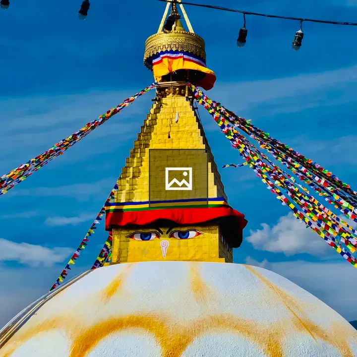 Boudhanath Stupa under blue sky