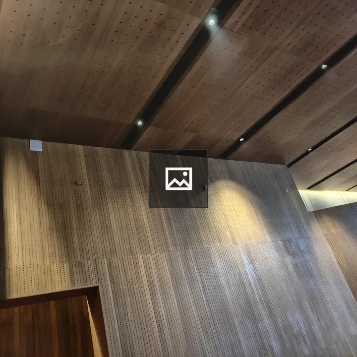 Interior with Wooden Paneling and Lighting