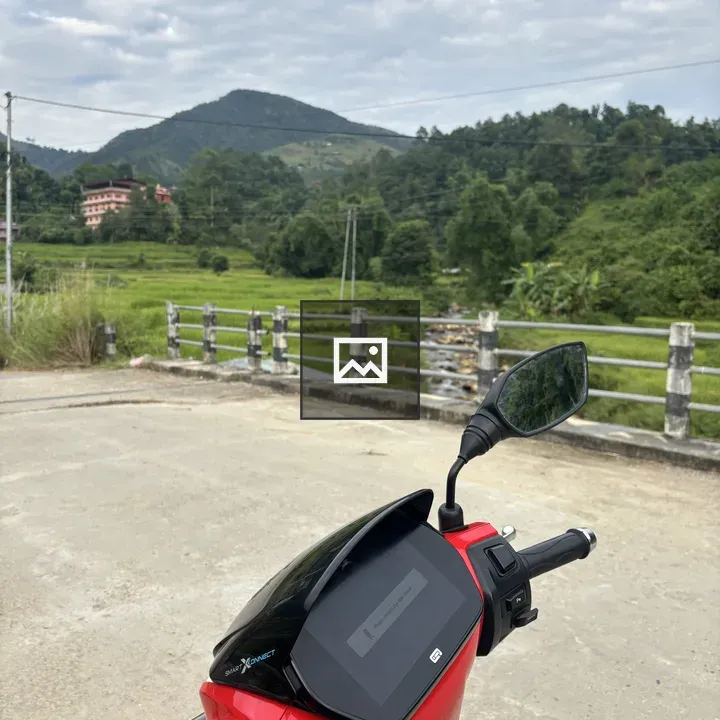 Red scooter on concrete