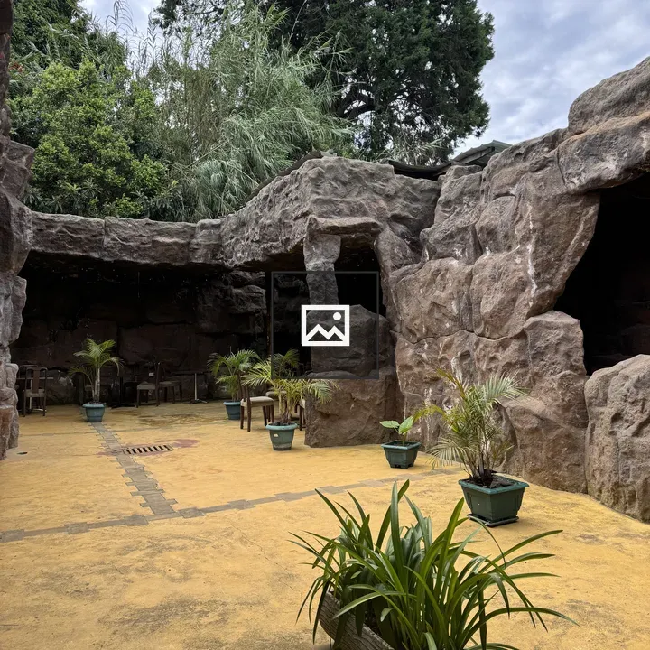 Outdoor stone walls with yellow floor