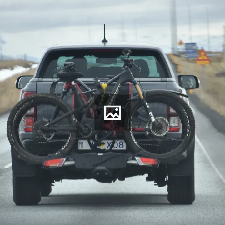 Suv car with bicycle on back