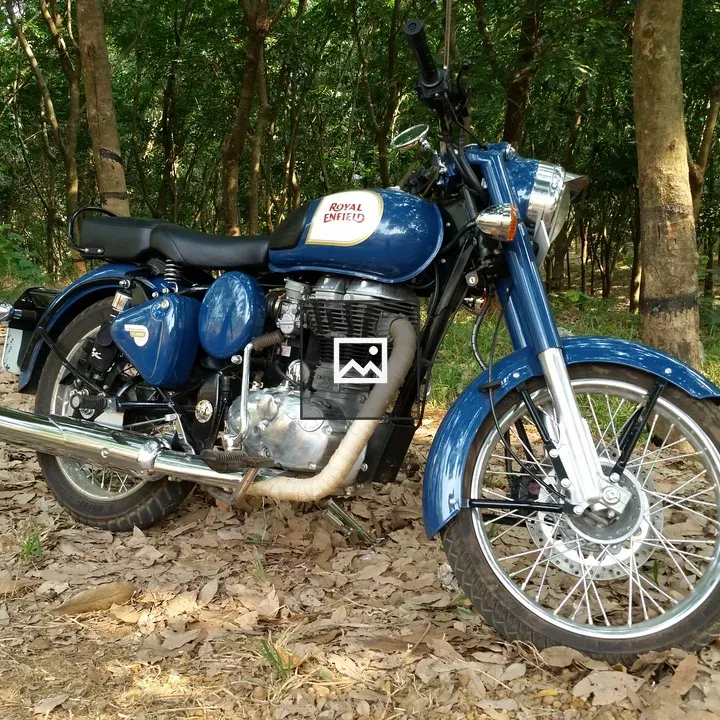 Motorcycle on Leaves in Nature