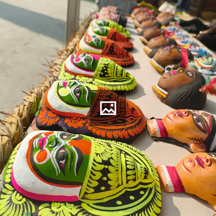 Colorful clay masks on table