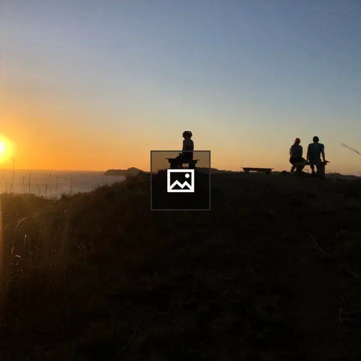 Mountain summit silhouettes at sunset