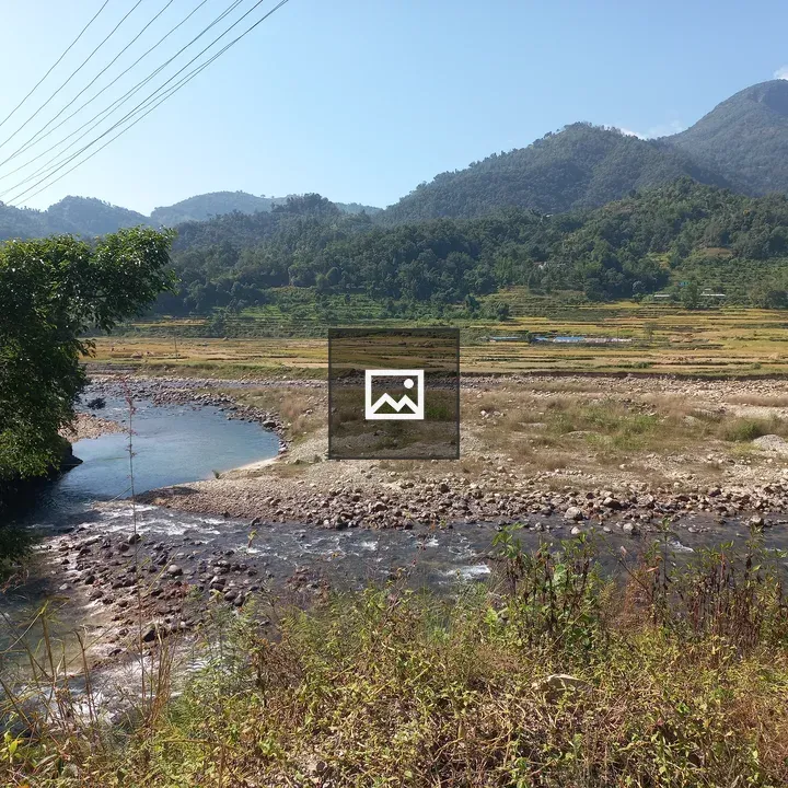 Winding river through terraced landscape