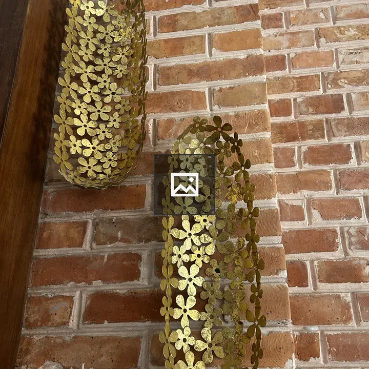 Decorative metal wall sconces