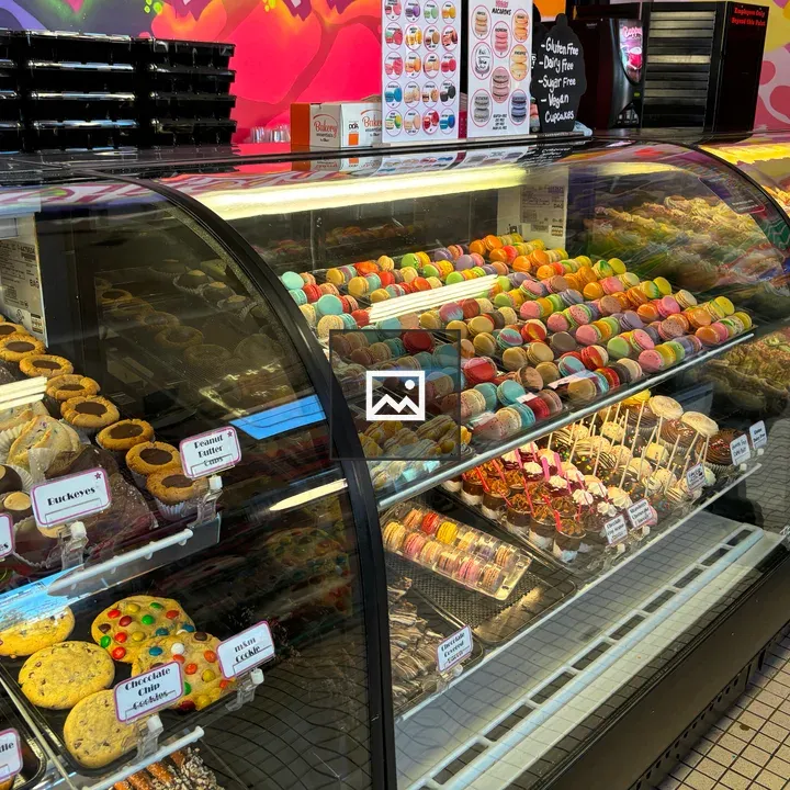 Shop case full of cookies and other sweets