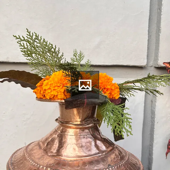 Copper Pitcher with Marigolds