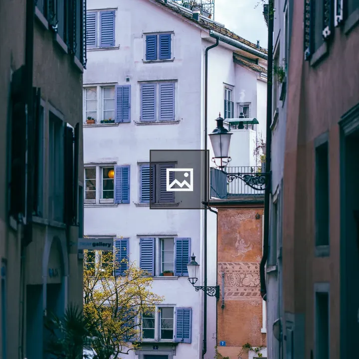 Pastel street with blue door and car
