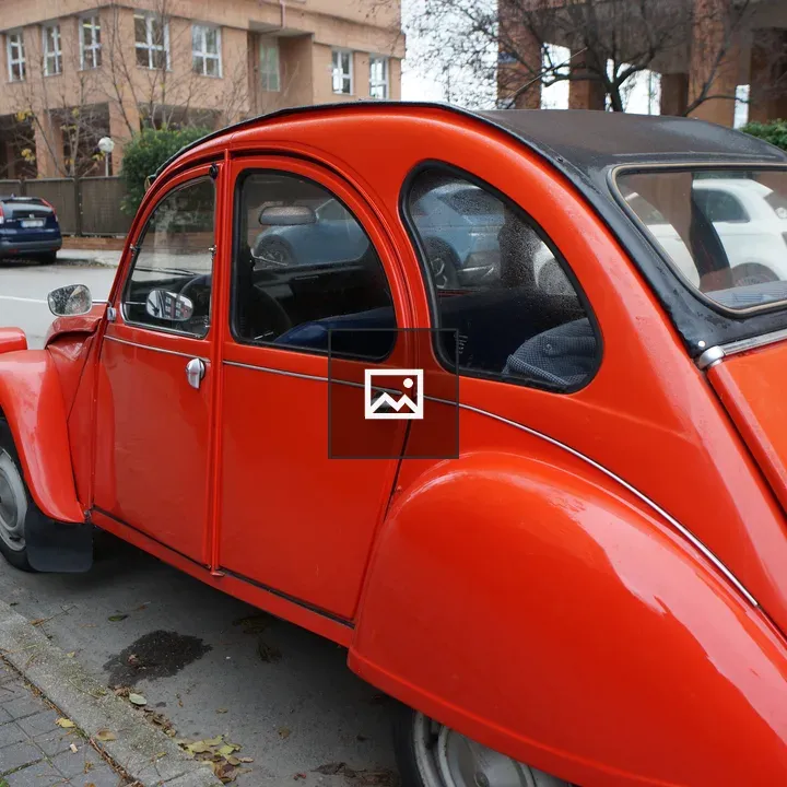 Vintage red car on street