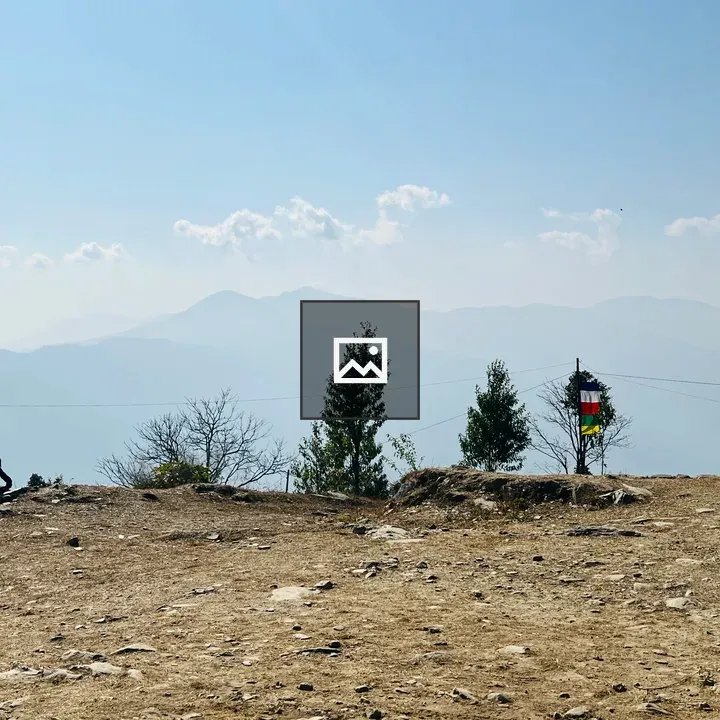 Paraglider over mountains