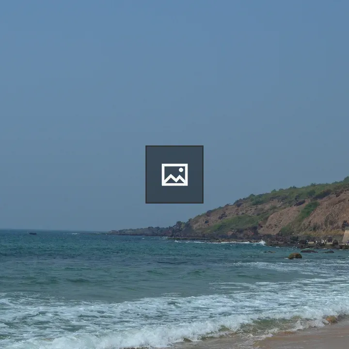 Beach scene with rocky coastline