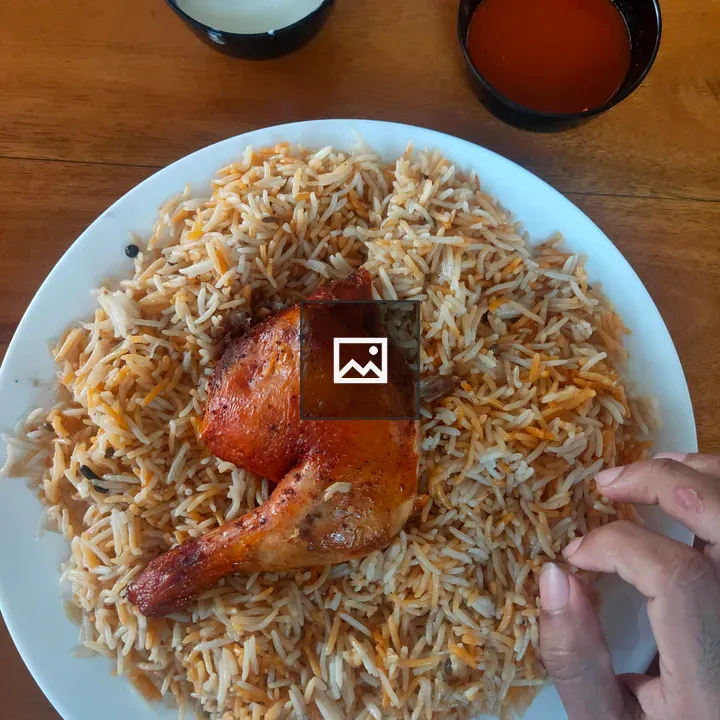 Kuzhimandhi rice dish