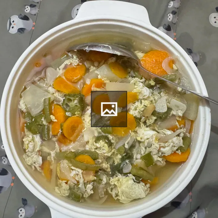 Vegetable and Egg Drop Soup in White Bowl