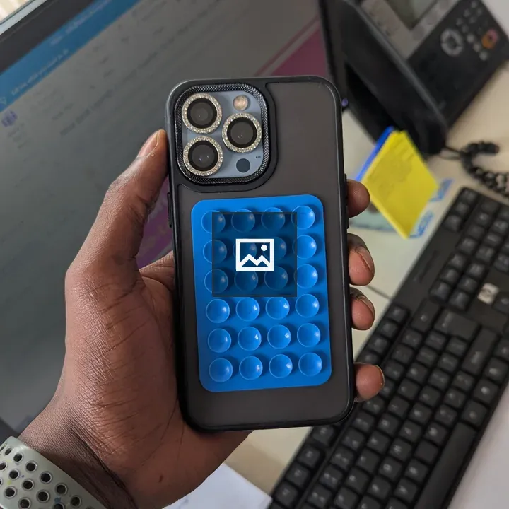 Person with Smartphone in Office
