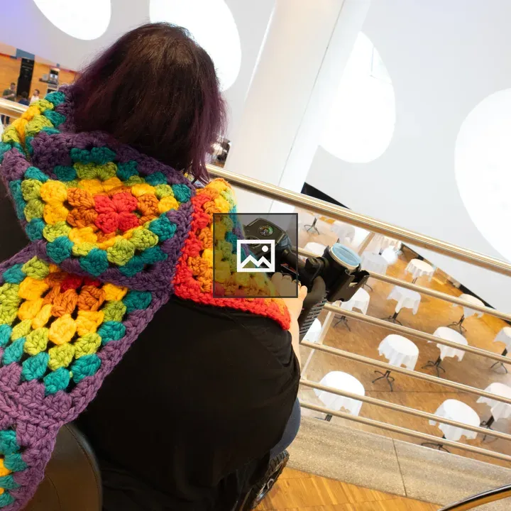 Rainbow scarf on wheelchair