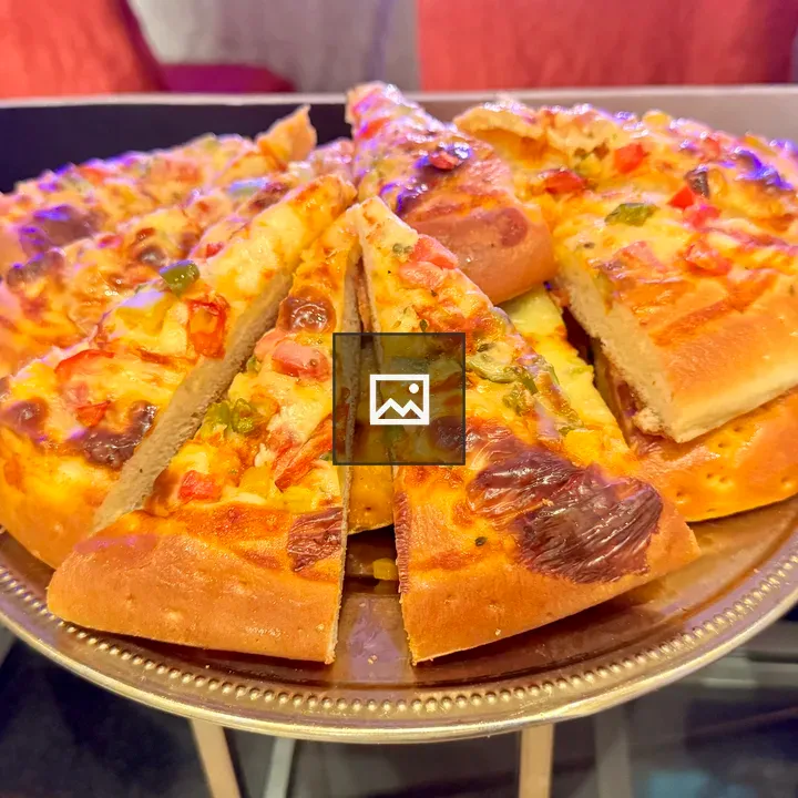 Pizza slices on a silver platter
