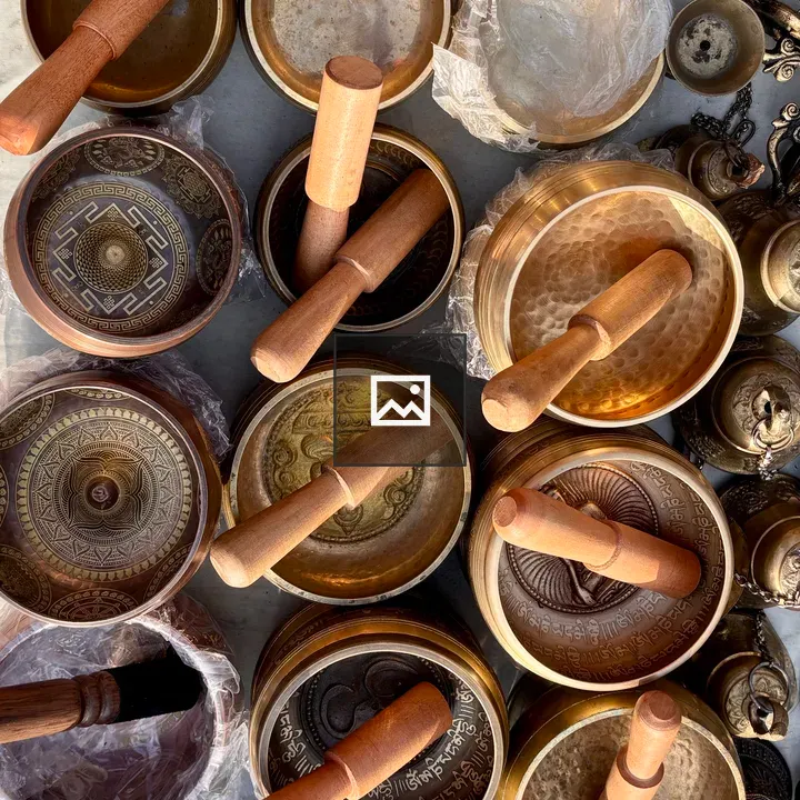 Singing bowls on surface