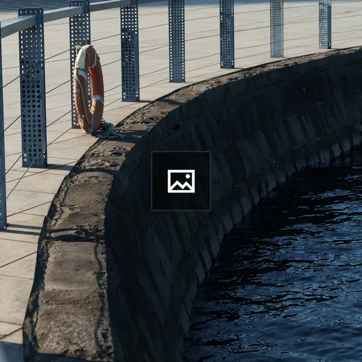 Lifebuoy by Waterfront Wall