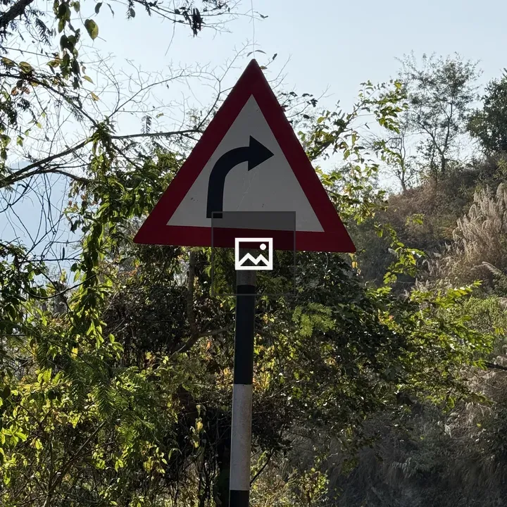 Triangular Road Sign with Right Turn