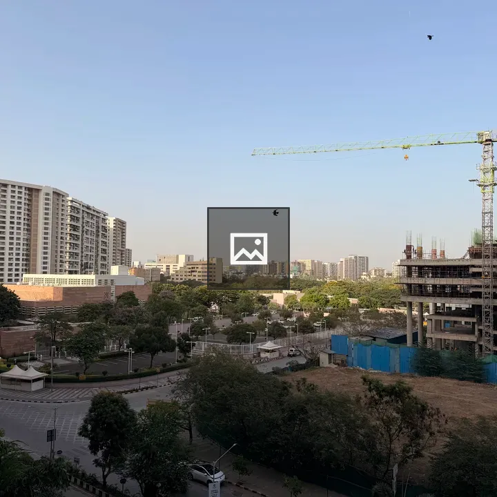 City skyline with crane and unfinished building