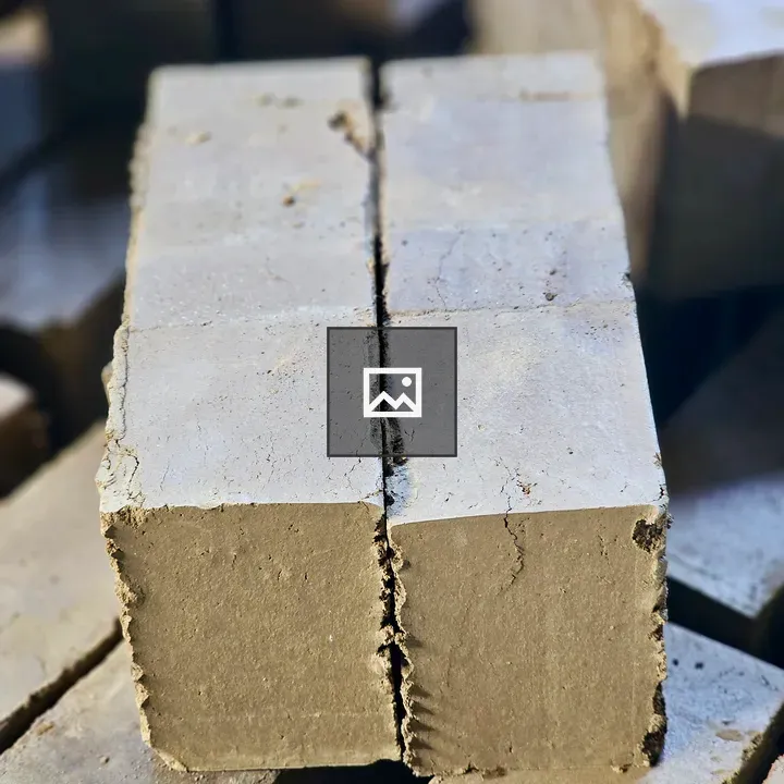 Freshly cut mud bricks stack