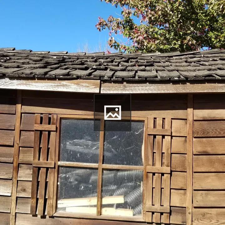 Upper half of old wooden shed