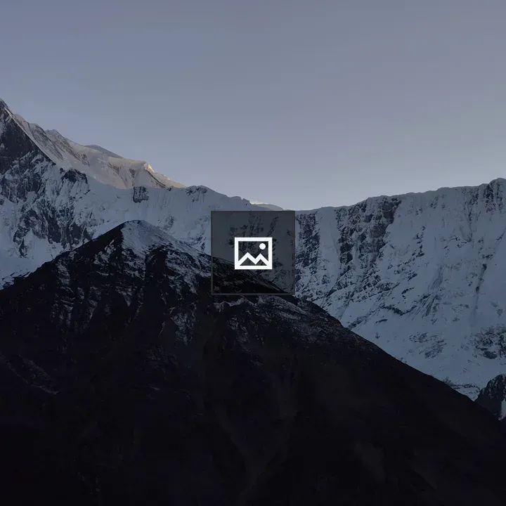 Panorama of Snowy Mountain Peaks