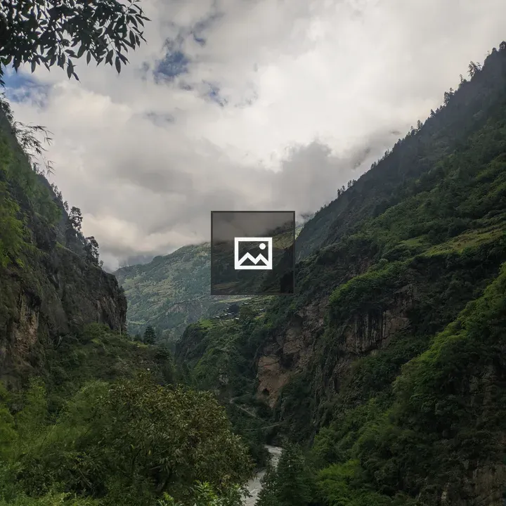 Valley landscape with river and clouds