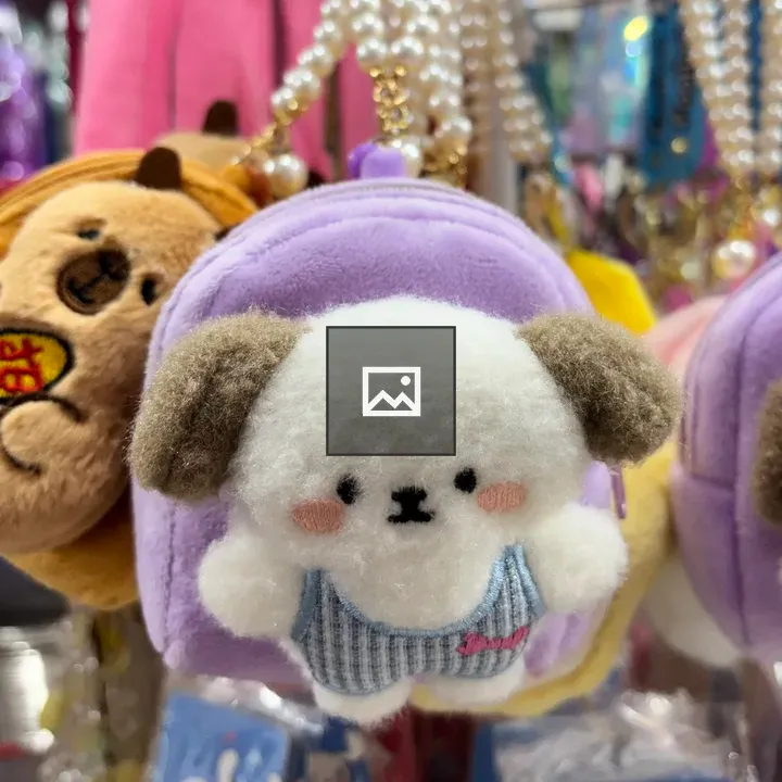 Stuffed Animal on Purse Strap
