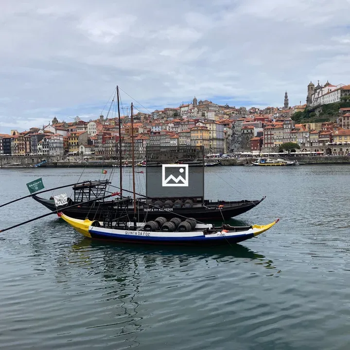 Two boats moored on river