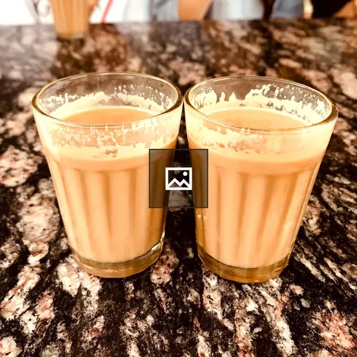 Milk tea on dark countertop