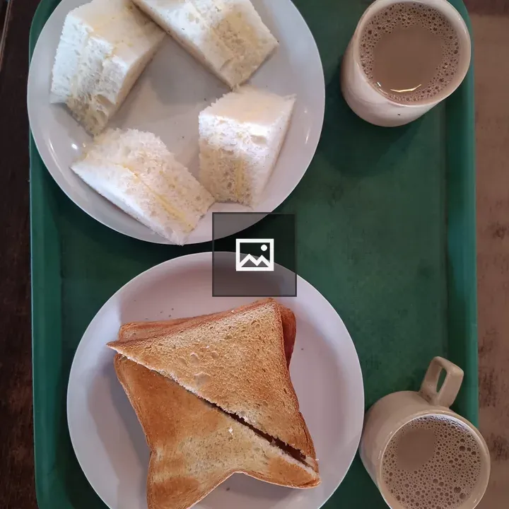 Sandwiches and Coffee on Green Tray