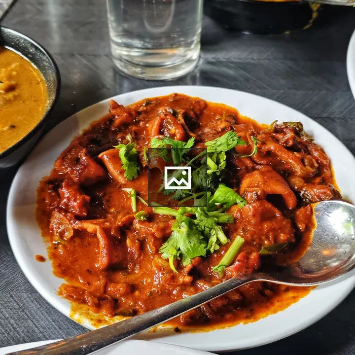 Spicy squid plate with cilantro