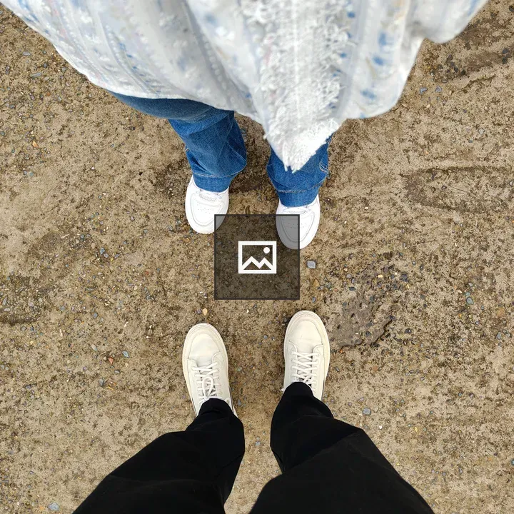Feet on sandy surface