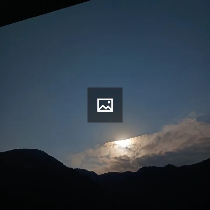 Silhouette of Mountain Range at Dusk