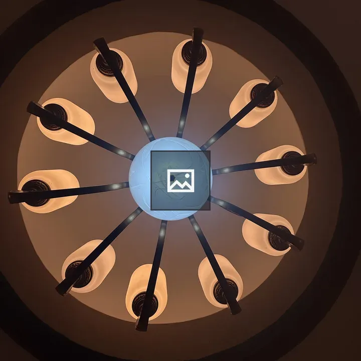 Circular chandelier with blue central light