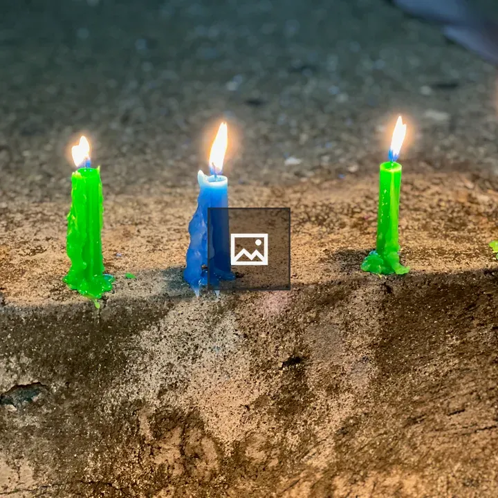 Candles Burning for Noche de las Velitas
