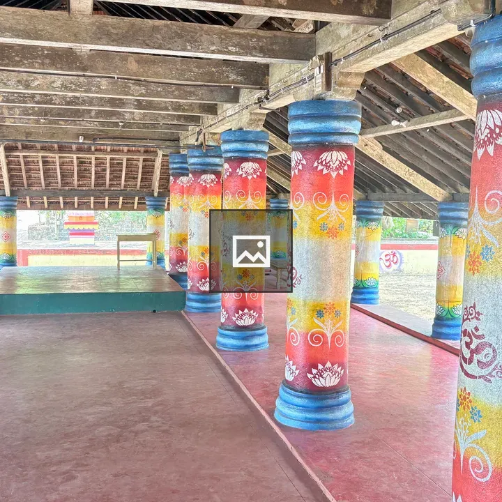 Interior with colorful column carvings