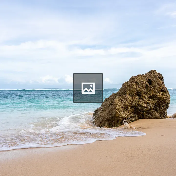 Rocky outcrop on sandy beach