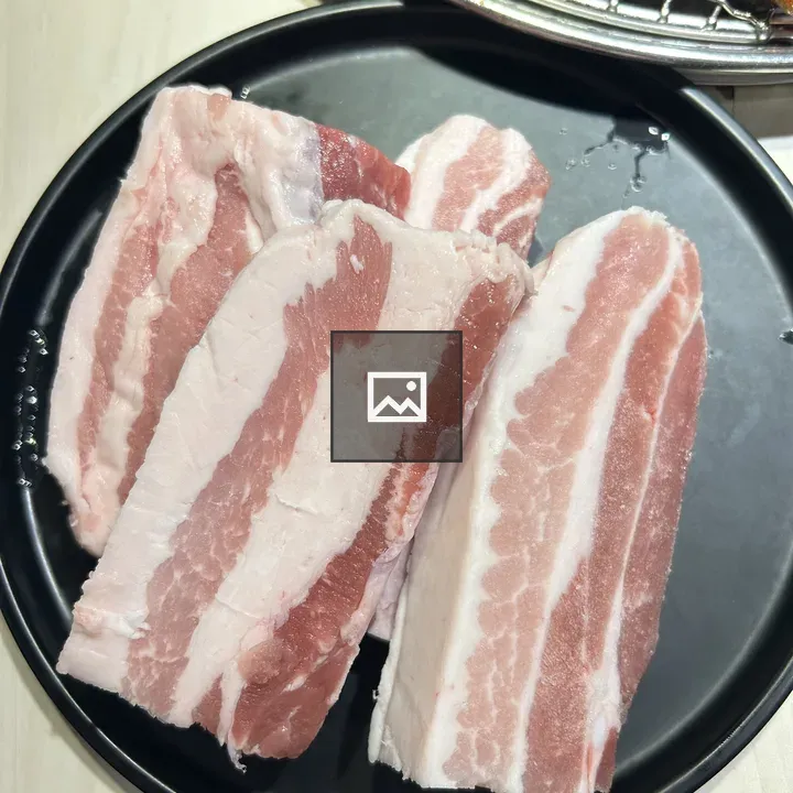 Pork Belly on Black Plate